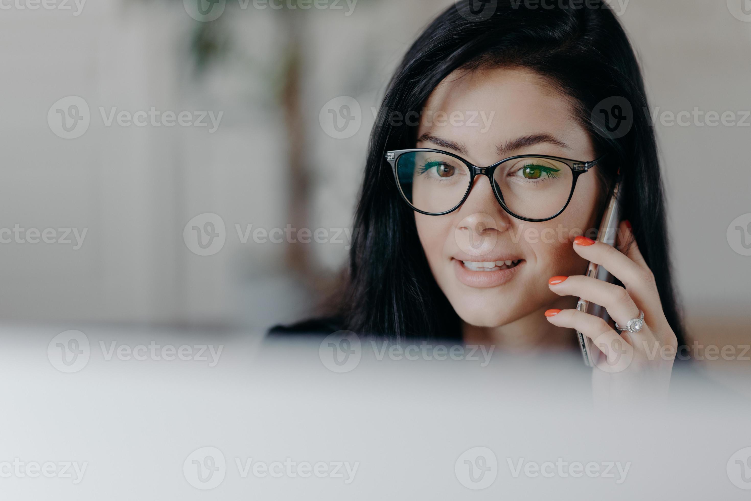 Horizontal Shot Of Attractive Brunette Female Employee With