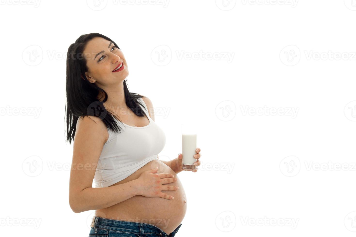 Attractive Pregnant Brunette Girl In Big Belly Posing Isolated On White