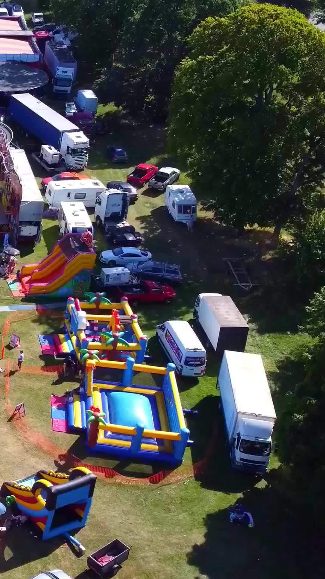 Aerial Footage Of Funfair People Are Enjoying Hot Summer At A Local Public Park Of Luton Town