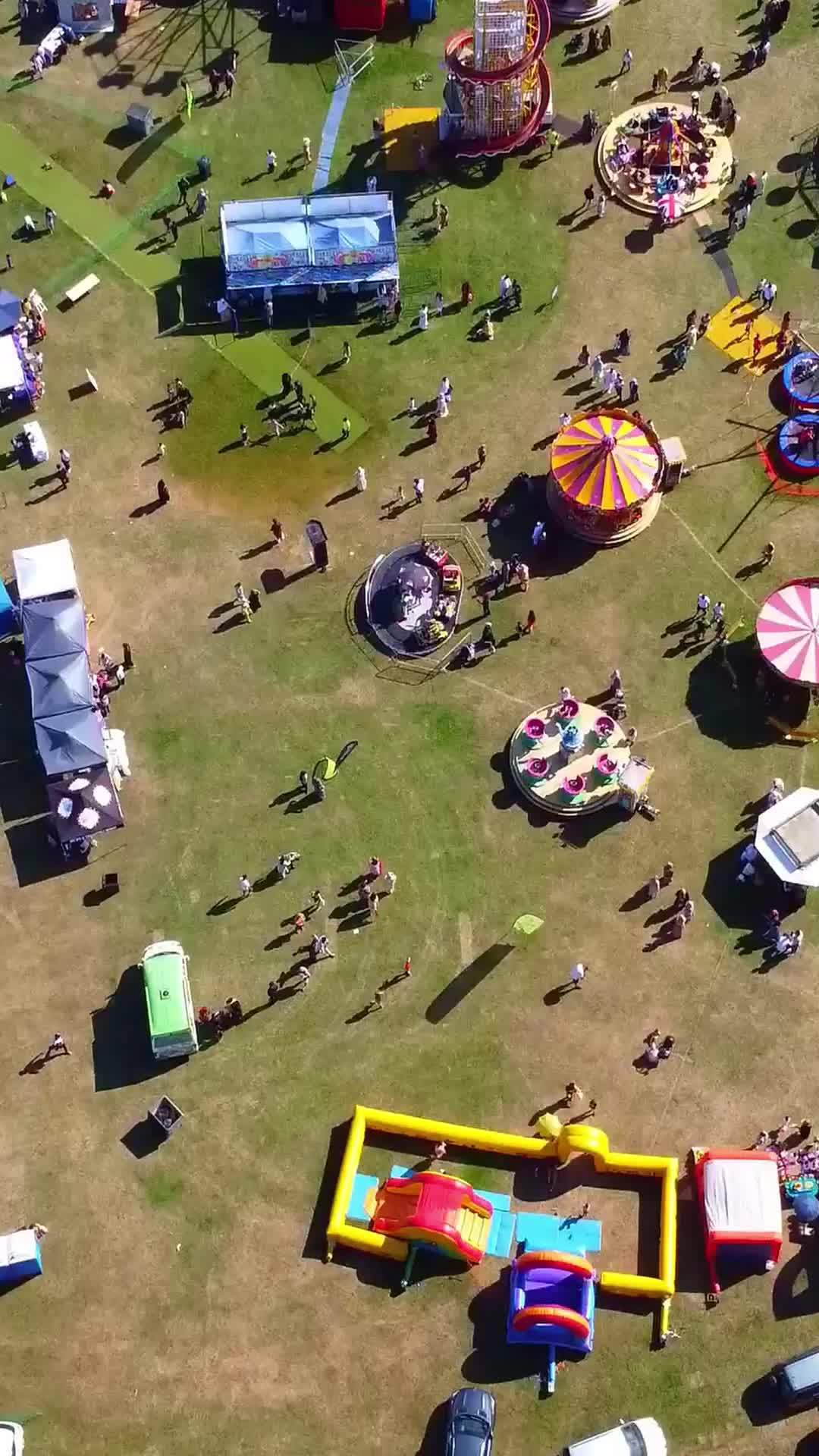 Aerial Footage Of Funfair People Are Enjoying Hot Summer At A Local Public Park Of Luton Town