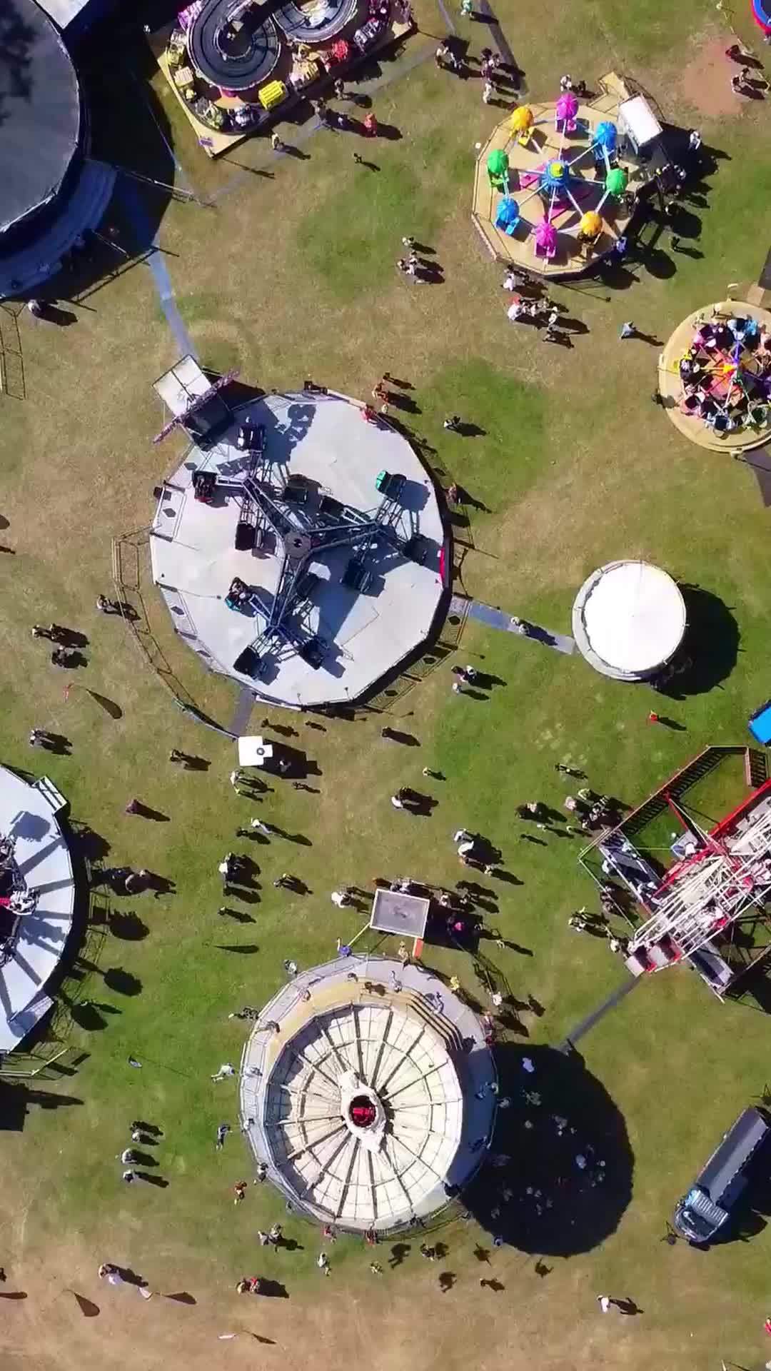 Aerial Footage Of Funfair People Are Enjoying Hot Summer At A Local Public Park Of Luton Town