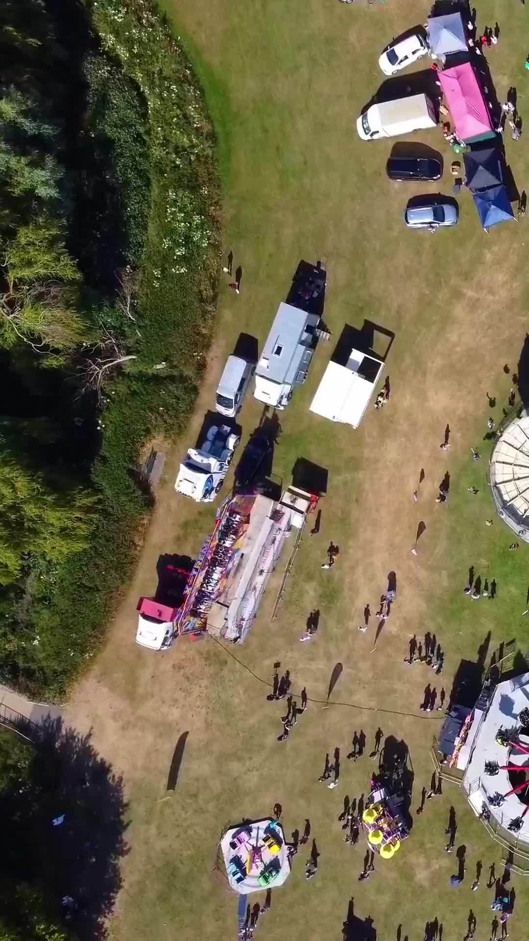 Aerial Footage Of Funfair People Are Enjoying Hot Summer At A Local Public Park Of Luton Town