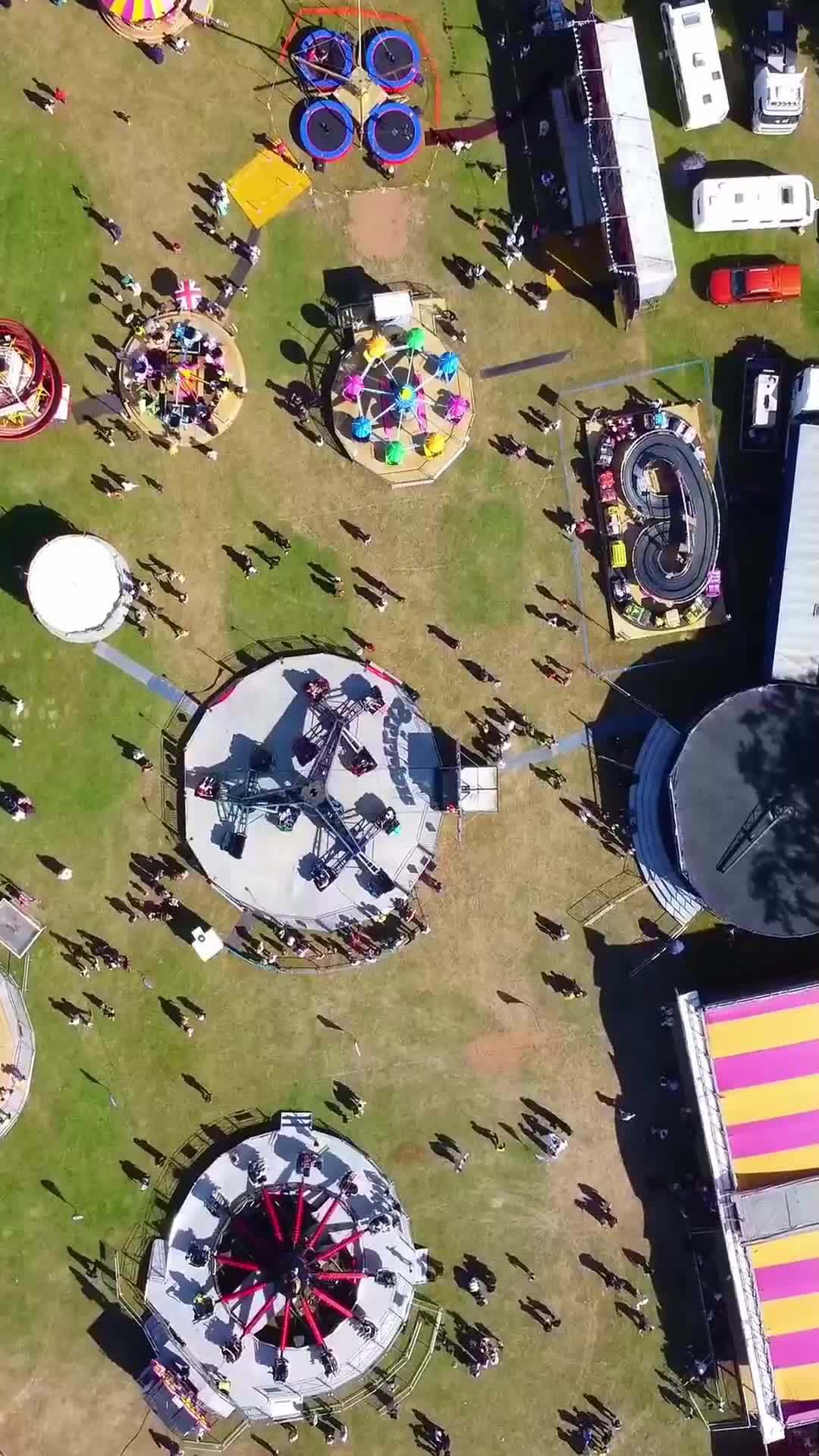 Aerial Footage Of Funfair People Are Enjoying Hot Summer At A Local Public Park Of Luton Town