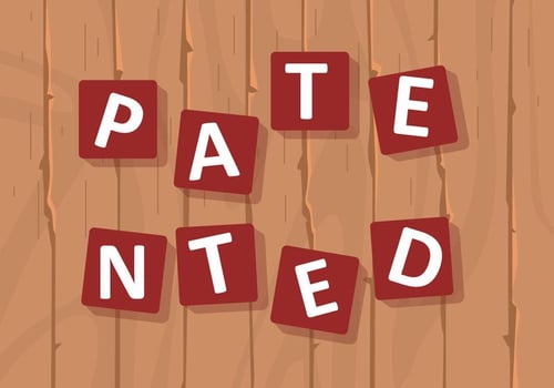 Sign Of Patented In Puzzle Of Wood Background vector
