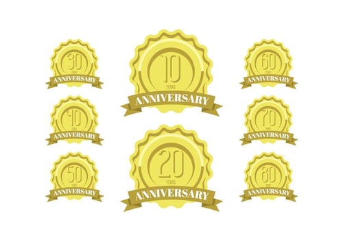 Anniversary celebration golden labels and badges vector