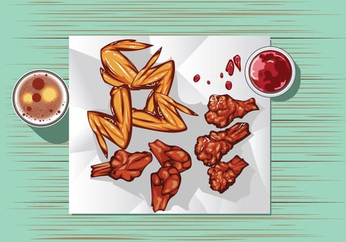 Buffalo Wings with Sauce and Beer on the Table vector