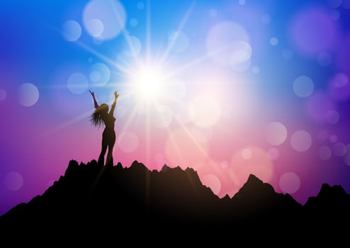 Female on a mountain landscape with arms raised in joy vector