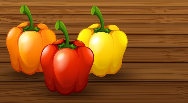 Three Different Bell Pepper on Wooden Background vector