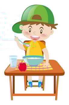 Little boy at dining table eating breakfast vector