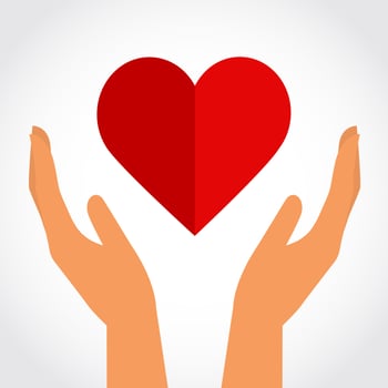 Heart above hands vector