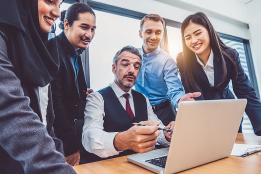 Group of business people working on laptop photo