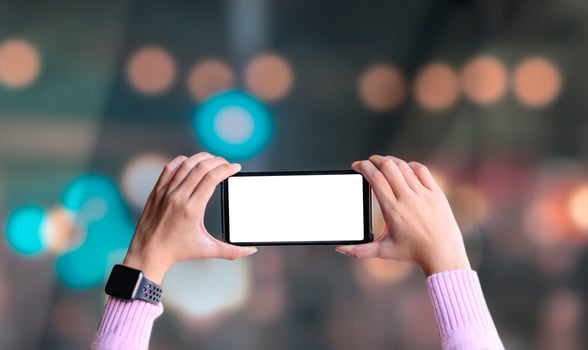 Female hands holding smart phone  photo