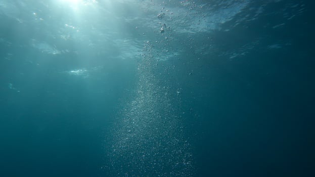 Bubbles under water photo