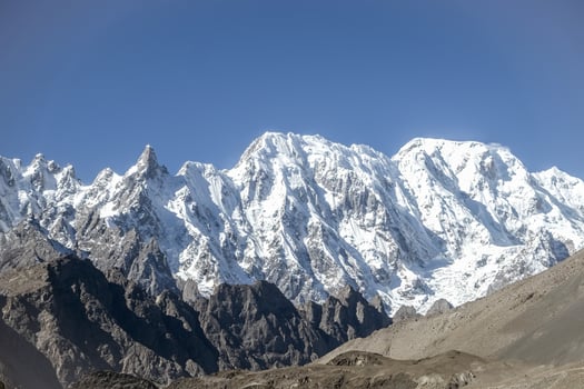 Snow capped mountains in the Karakoram range photo