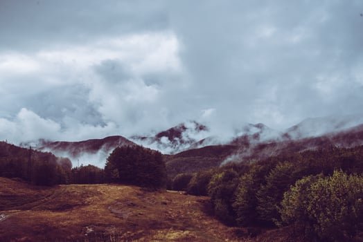 Foggy mountainous landscape photo