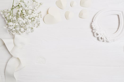 Mockup background with flowers and paper hearts photo