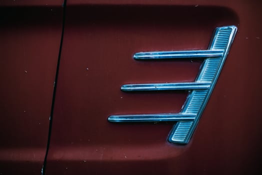 Red car with silver grille photo