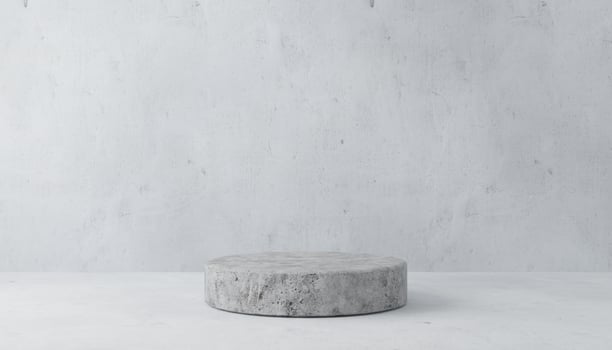 Concrete podium on gray background photo