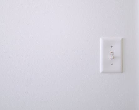 White wall with a light switch photo