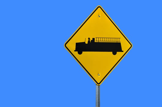 Yellow and black firetruck sign photo