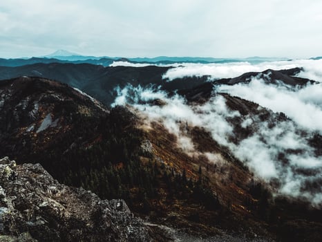 Cloudy mountain peak photo