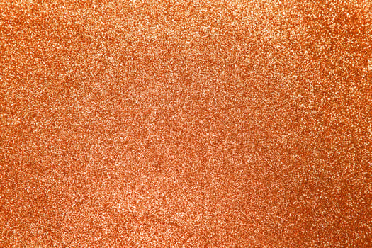 Orange glitter shiny texture background  photo
