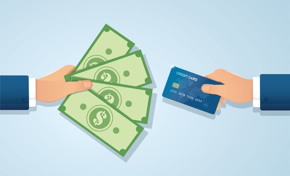 Hands holding credit card and money bills vector