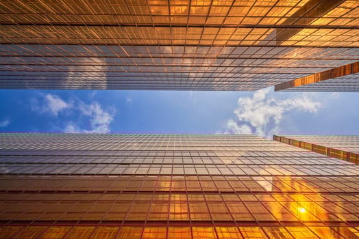 Golden lighting between buildings photo
