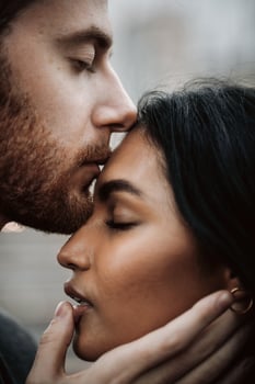 Attractive couple embraces photo