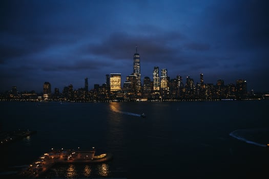 Illuminated city skyline at night photo