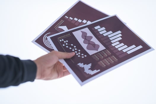 Hand holding documents photo