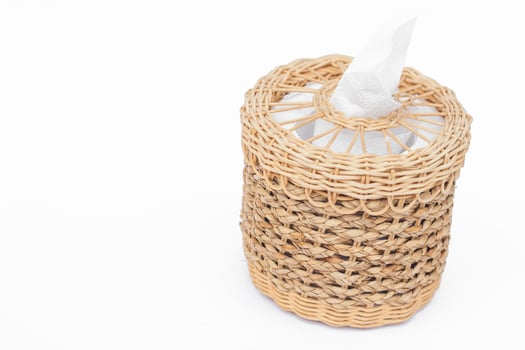 Woven tissue box on a white background photo