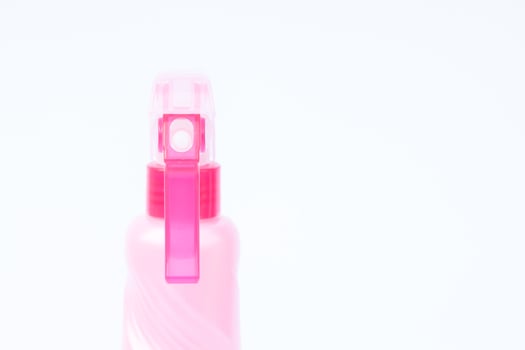Close-up of a spry bottle on a white background photo