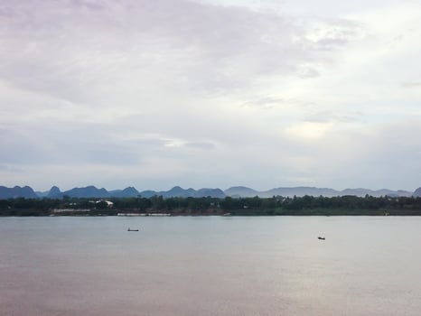 Cloudy day over a body of water photo