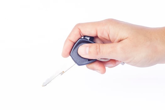 Hand with car key photo