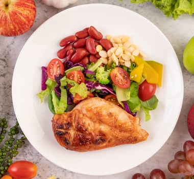 Grilled chicken steak and vegetables photo