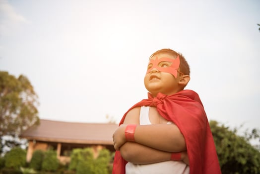 Super boy showing his powerful flying arms photo