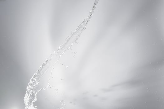 Water over grey background photo