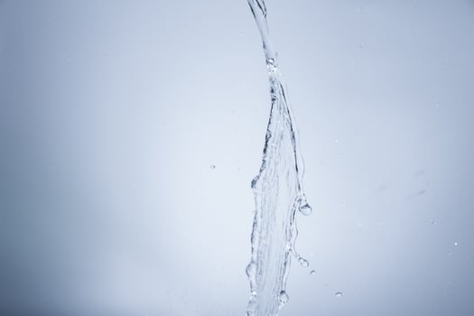 Water over grey background photo