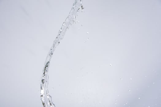 Water over grey background photo