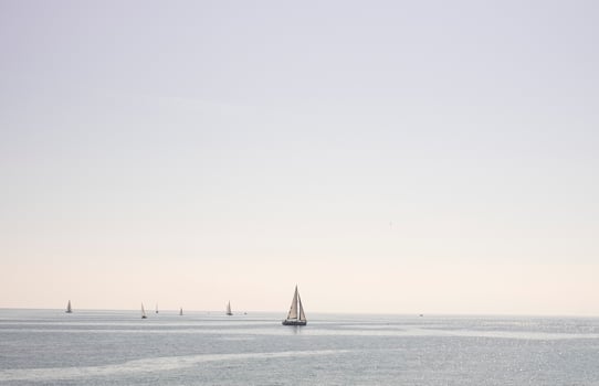 sailboat sailing in the sea in a clear day photo