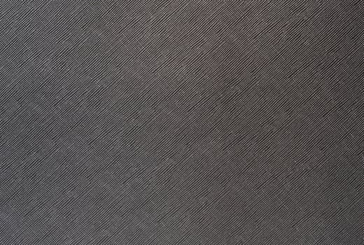 Grey background from a textile material with wicker pattern, closeup. photo