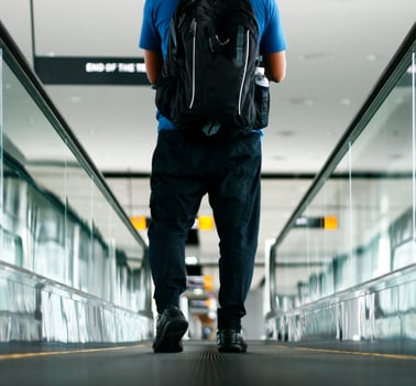 Pedestrian walking with zooming motion blur photo