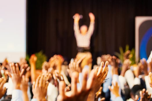 People raising hands photo