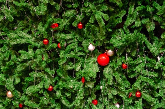 Christmas tree with red ornaments photo