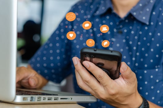 Man using a smart phone photo