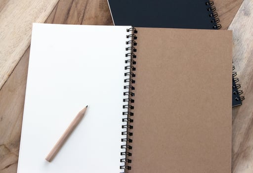 Notebook with pencil photo