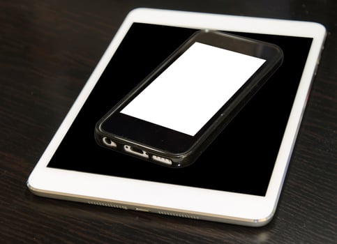 Smart phone and tablet with blank screens photo