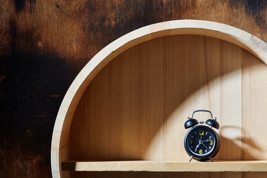 Clock on shelf photo