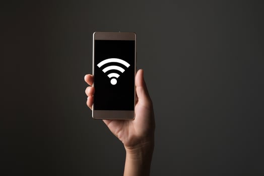 Wifi icon on smart phone screen photo
